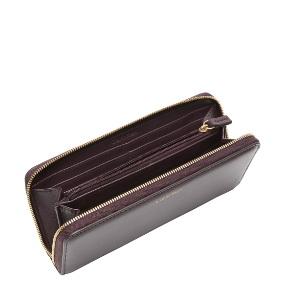 Πορτοφόλι CALVIN KLEIN Puller Large Zip Around 1093G Μπορντώ